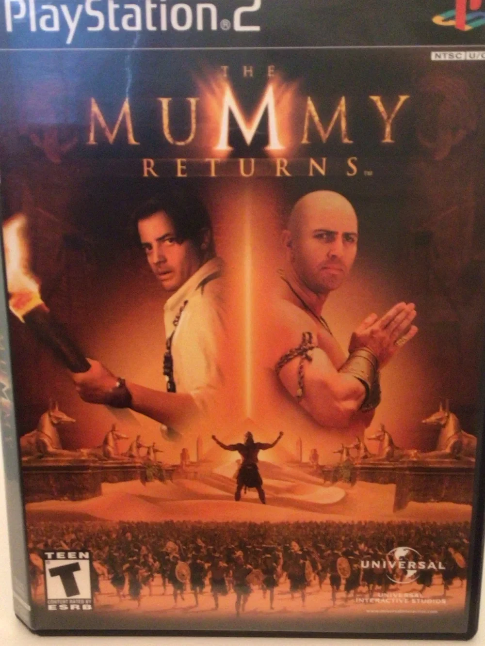 Sony PlayStation 2 The Mummy Returns (orange, black)
